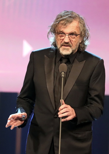 Jury president, Serbian director Emir Kusturica  Hani Adel and his wife attend the opening of the 43rd edition of the Cairo International Film Festival at the Cairo Opera House in the Egyptian capital on November 26, 2021. Photos: IC