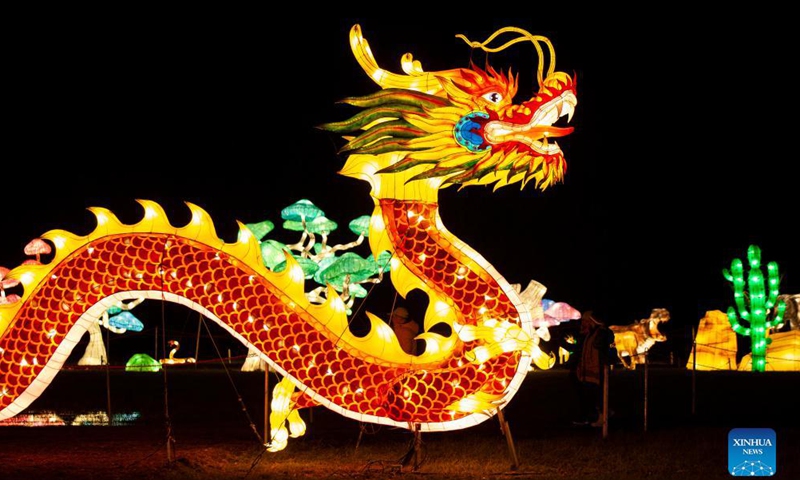 Visitors view light installations during the Seasky International Light Show in Niagara Falls, Ontario, Canada, on Dec. 4, 2021.Photo:Xinhua