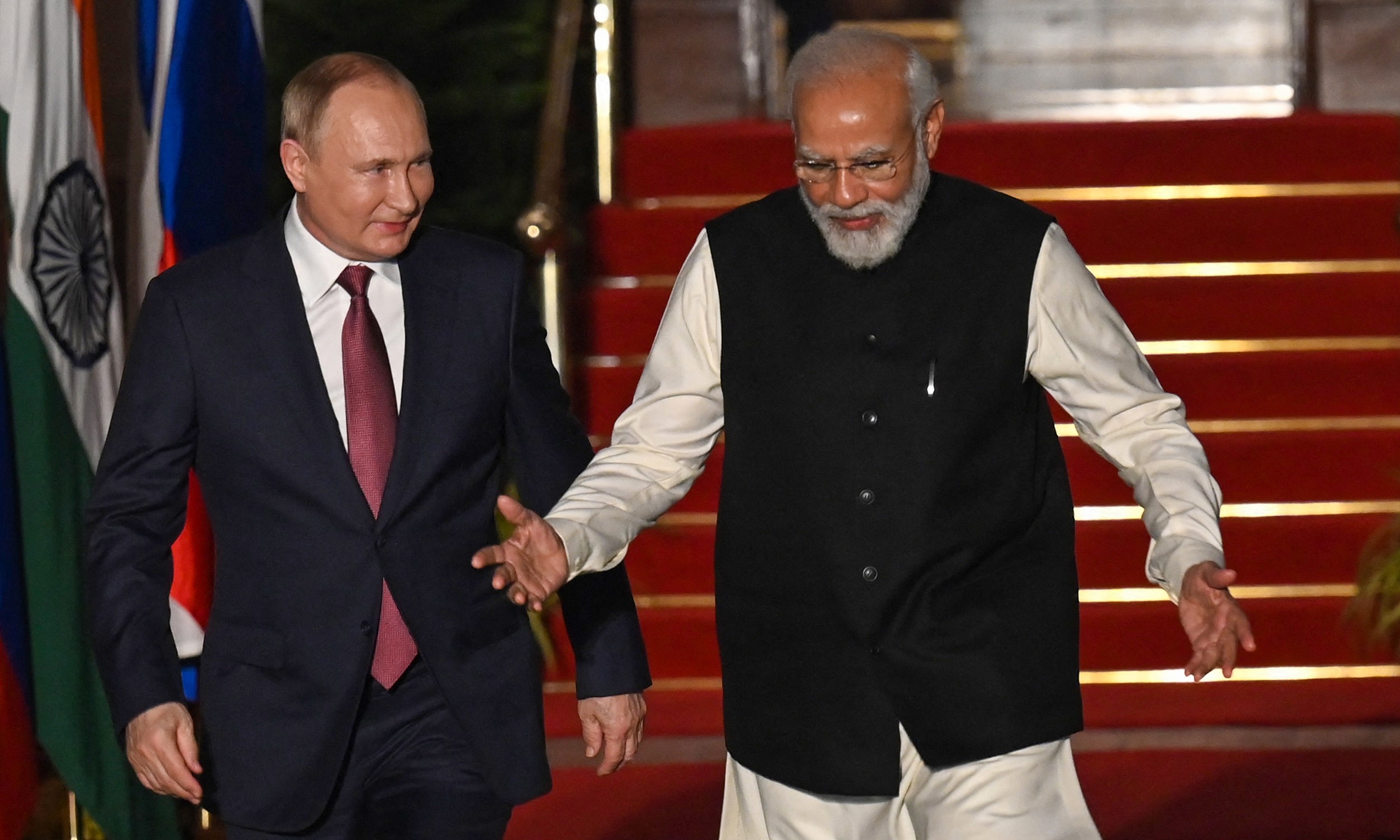 India's Prime Minister Narendra Modi (right) greets Russian President Vladimir Putin before a meeting at Hyderabad House in New Delhi on December 6, 2021. Photo: AFP