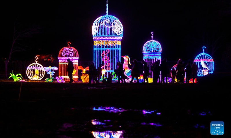 Visitors view light installations during the Seasky International Light Show in Niagara Falls, Ontario, Canada, on Dec. 4, 2021.Photo:Xinhua