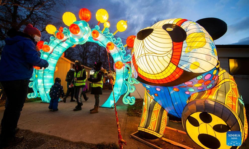Visitors view light installations during the Seasky International Light Show in Niagara Falls, Ontario, Canada, on Dec. 4, 2021.Photo:Xinhua