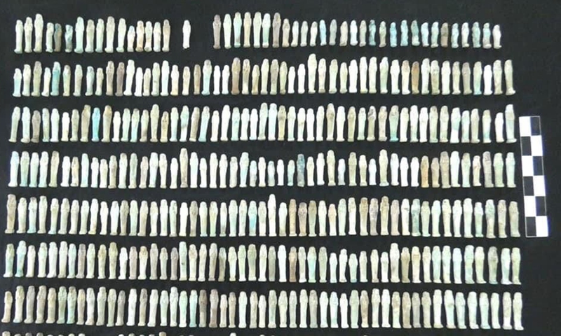 The undated photo shows Ushabti figurines unearthed from an ancient tomb in Minya Governorate, Egypt.Photo:Xinhua