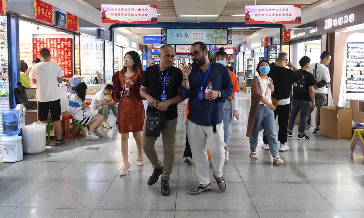 Foreign online celebrities visit the Yiwu International Trade Market in East China's Zhejiang Province on June 7, 2021. Photo: cnsphoto