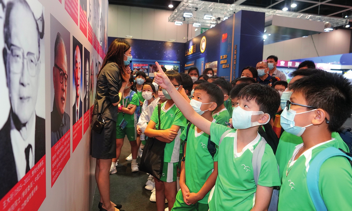 Primary school students visit an exhibition showcasing China's scientific achievements in the past 100 years at the Hong Kong Convention and Exhibition Center on July 7, 2021. Photo: IC