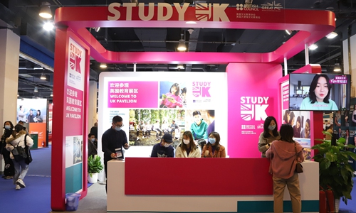 Audience visit British booth at the China Education Expo on October 23 Photo: cnsphoto