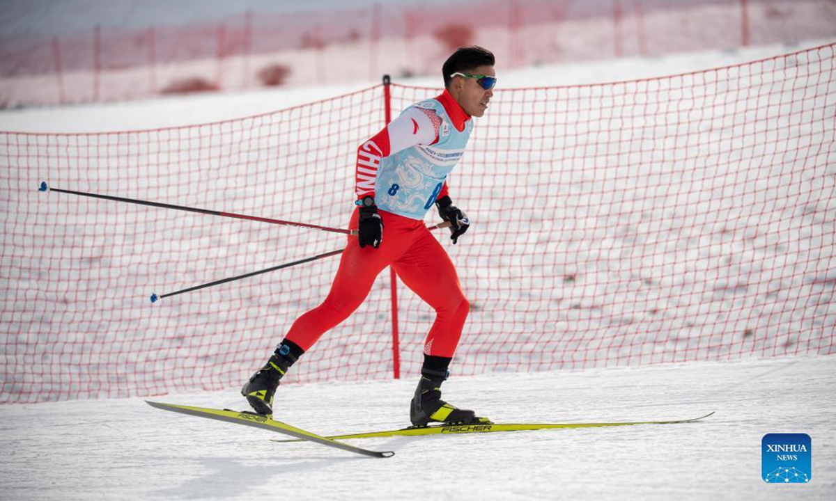 Torsongan Bullik competes in a men's 10km cross-country skiing competition in Wenquan County, northwest China's Xinjiang Uygur Autonomous Region, Nov. 22, 2021.(Photo:Xinhua)