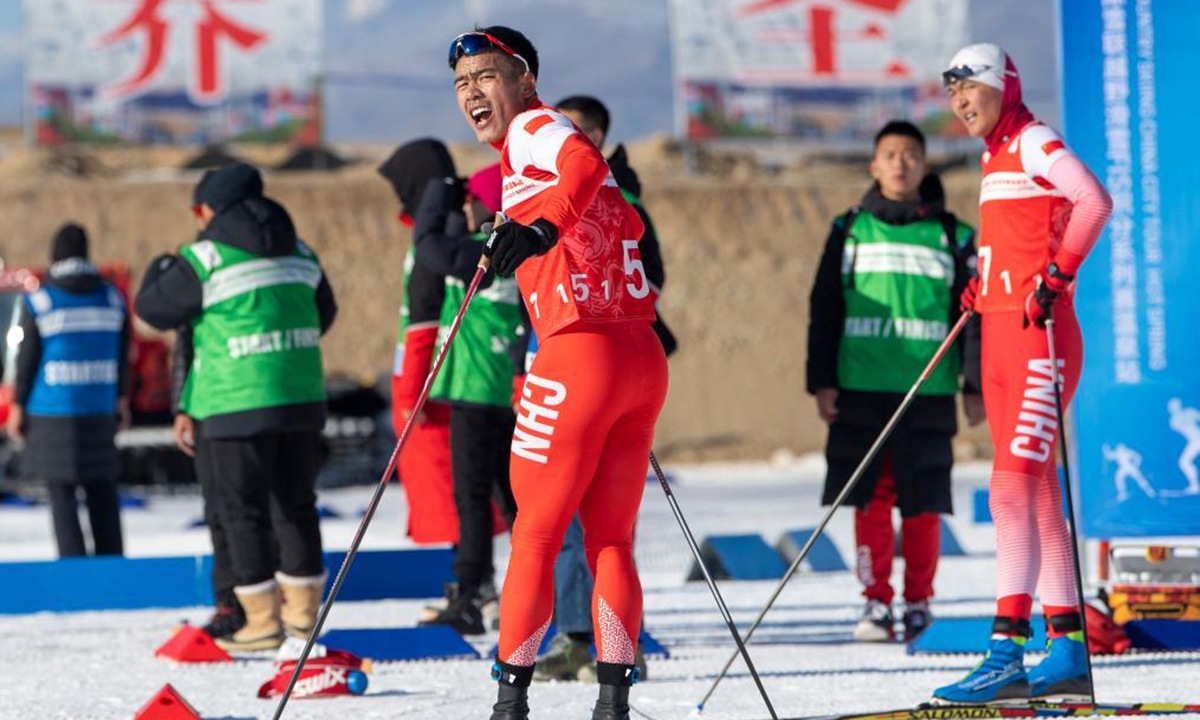 Torsongan Bullik competes in a cross-country skiing competition in Wenquan County, northwest China's Xinjiang Uygur Autonomous Region, Nov. 24, 2021.(Photo:Xinhua)