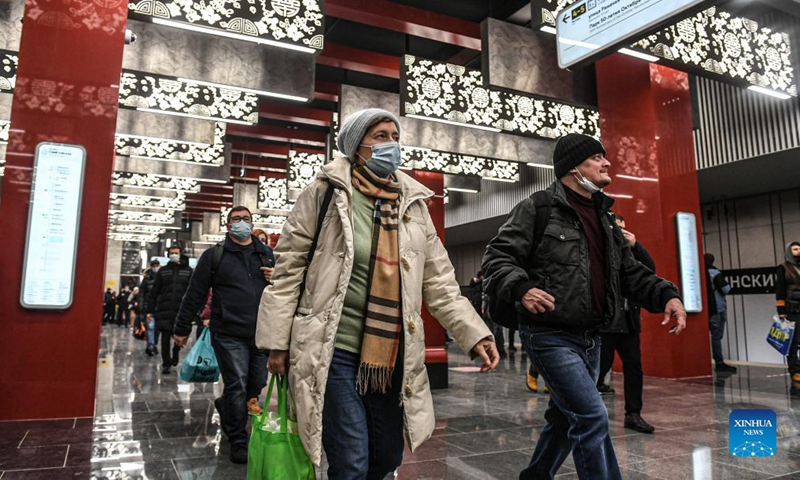Passengers walk at the Michurinsky Prospekt station in Moscow, Russia, Dec. 7, 2021. A new section of the Moscow Metro, part of which was built by China Railway Construction Corporation Limited (CRCC) was launched on Tuesday. It was the first time for Russia to introduce a Chinese enterprise in its metro construction, which was also marked as the first metro project of a Chinese company in Europe. (Xinhua)