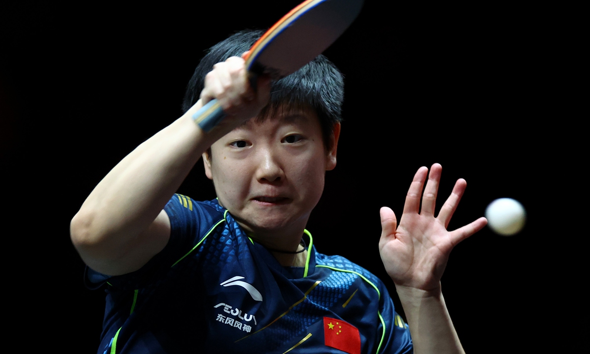 Sun Yingsha plays a forehand against compatriot Wang Yidi on December 7, 2021 in Singapore.  Photo: VCG