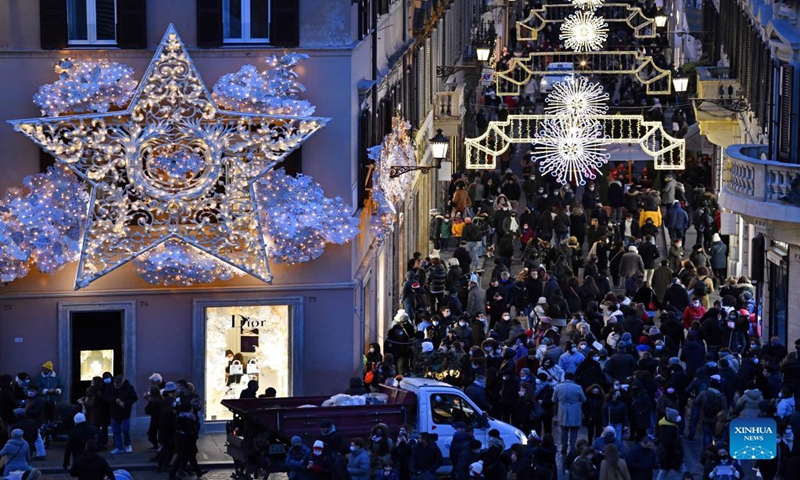 Via dei Condotti decorated with holiday lights is seen in Rome, Italy, on Dec. 11, 2021. (Xinhua)