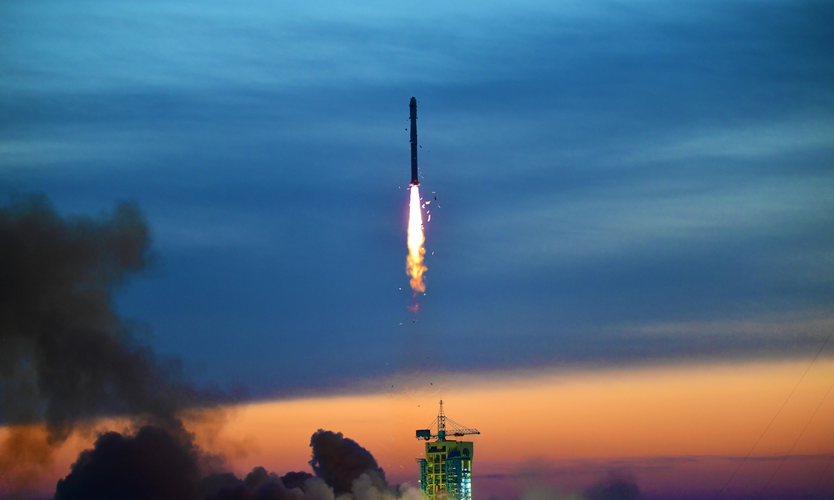 A Long March-4B rocket carrying the Shijian-6 05 satellites blasts off from the Jiuquan Satellite Launch Center in Northwest China, on Dec 10, 2021.  Photo: Xinhua