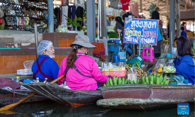 Vendors wait for tourists at the Damnoen Saduak Floating Market in Ratchaburi, Thailand, Dec. 11, 2021.Photo:Xinhua
