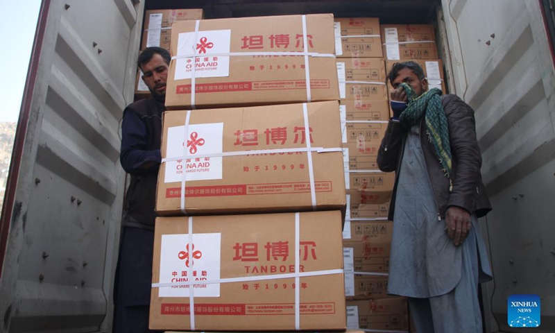 The second batch of winter supplies donated by China arrives in Kabul, capital of Afghanistan, Dec. 13, 2021.(Photo: Xinhua)