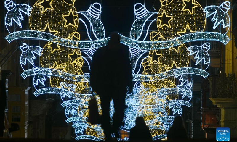 Christmas decorations are seen on the Merchant's Street, one of the main streets in Malta's capital Valletta, Dec. 15, 2021. Malta's capital Valletta has been lit up with decorations as Christmas approaches.(Photo: Xinhua)