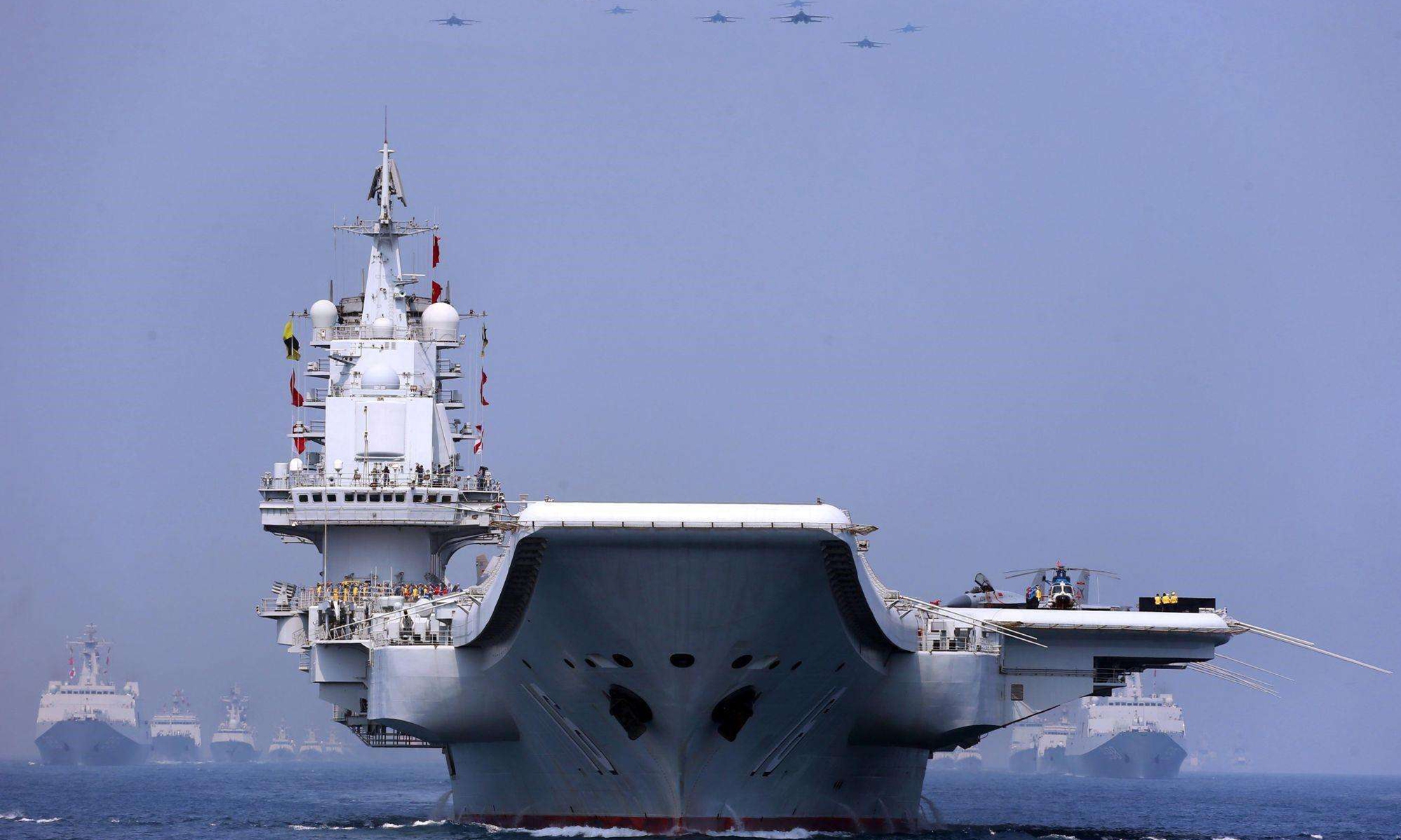 The picture shows the aircraft carrier <em>Liaoning</em> (Hull 16) and other vessels and fighter jets in the maritime parade conducted by the Chinese People's Liberation Army (PLA) Navy in the South China Sea on the morning of April 12, 2018.Photo:China Military