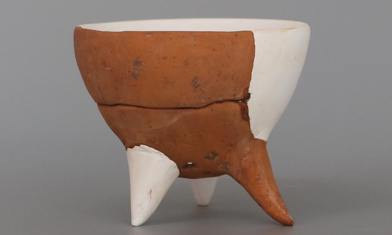 File photo shows a piece of pottery found in the Peiligang cultural site in Xinzheng, central China's Henan Province.Photo:Xinhua