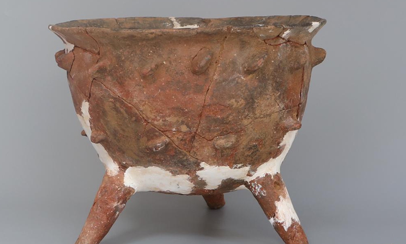 File photo shows a piece of pottery found in the Peiligang cultural site in Xinzheng, central China's Henan Province.Photo:Xinhua
