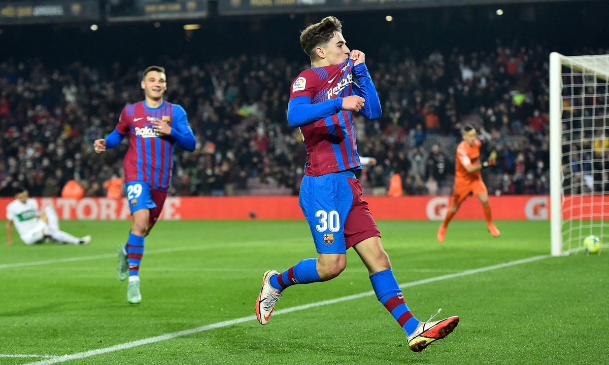 Barcelona midfielder Gavi celebrates scoring his team's second goal during the match against Elche CF at the Camp Nou stadium in Barcelona, Spain on December 18, 2021.Photo: VCG