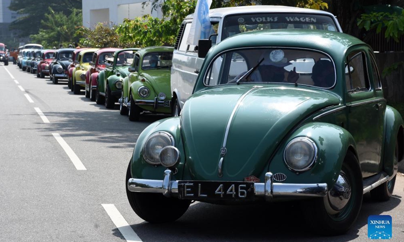 Vintage cars are seen at the Beetle car rally in Colombo, Sri lanka on Dec. 19, 2021.Photo:Xinhua