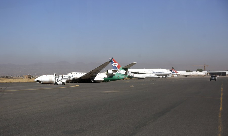 A passenger jet damaged in airstrkes by the Saudi Arabia-led coalition is seen on the tarmac of the Sanaa International Airport in Sanaa, Yemen, on Dec. 21, 2021.(Photo: Xinhua)