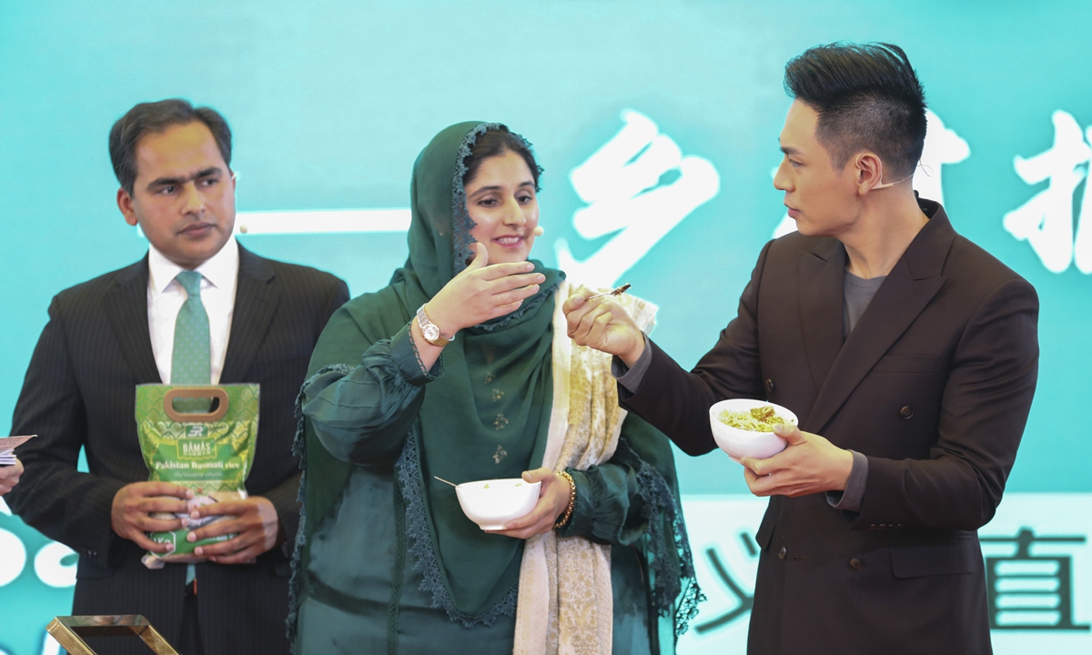 Naeem Iqbal Cheema and his wife are promoting Pakistani rice. Photo: CNS photo