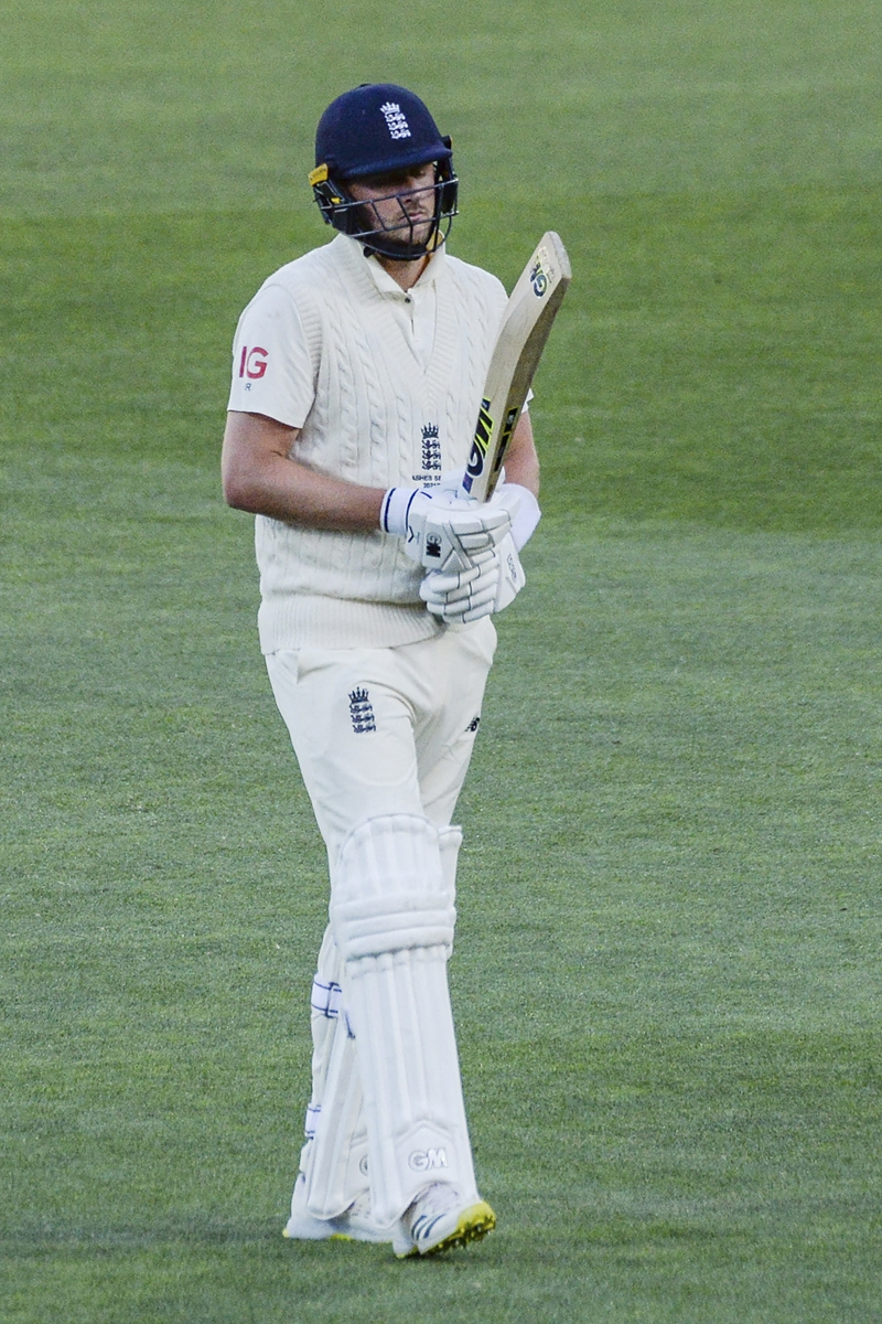 England's batsman Ollie Robinson walks off the field after his dismissal on the last day of the second cricket Test match of the Ashes series between Australia and England at Adelaide Oval on December 20, 2021, in Adelaide, Australia. Photo: AFP
