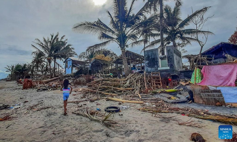Photo shows a fishing community damaged by Typhoon Rai along a shoreline in Leyte Province, the Philippines, Dec. 22, 2021.The National Disaster Risk Reduction and Management Council (NDRRMC) reported that 156 people died from the typhoon, while the Philippine National Police reported at least 375 deaths. Many more are missing or injured.(Photo: Xinhua)