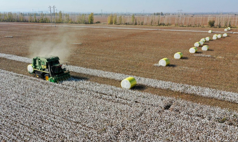 Aerial photo taken on Oct. 17, 2020 shows a cotton harvesting machine working in a field in Manas County, Hui Autonomous Prefecture of Changji, northwest China's Xinjiang Uygur Autonomous Region. File photo: Xinhua