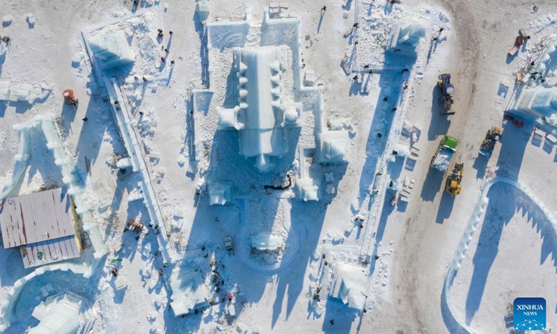 Aerial photo taken on Dec. 22, 2021 shows the construction site of the Harbin Ice-Snow World in Harbin, northeast China's Heilongjiang Province. The 23rd Harbin Ice-Snow World will open to the public on Saturday.(Photo: Xinhua)