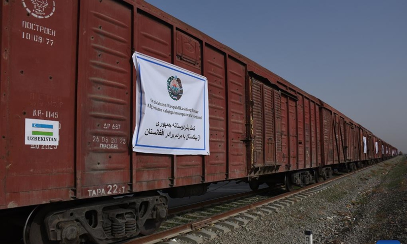 Rail wagons loaded with humanitarian aid provided by Uzbekistan arrive in Mazar-i-Sharif, Afghanistan on Dec. 23, 2021. Uzbekistan has provided 3,700 tons of humanitarian aid to war-torn Afghanistan to help needy people in the chilly winter.(Photo: Xinhua)