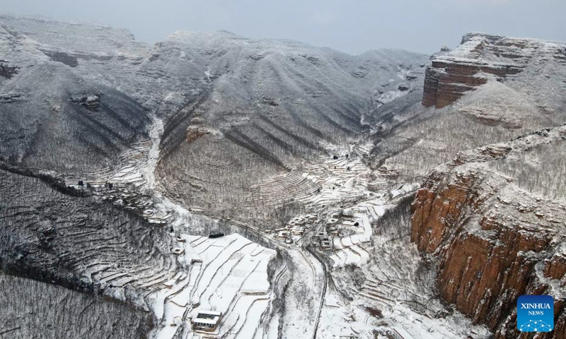 Aerial photo taken on Dec. 25, 2021 shows the snow scenery of Taihang Mountains in Shahe City, north China's Hebei Province.Photo:Xinhua