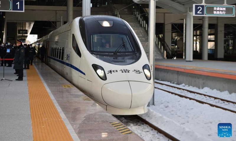 A high-speed train is about to depart from the station of Changbaishan, or Changbai Mountains, in northeast China's Jilin Province, Dec. 24, 2021. A new high-speed railway line reaching the foot of the Changbai Mountains in Jilin Province was put into operation on Dec. 24.(Xinhua/Lin Hong)
