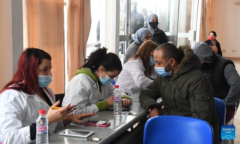 People register at a vaccination station during a national COVID-19 vaccination operation in Tunis, Tunisia, on Dec. 25, 2021.Photo:Xinhua