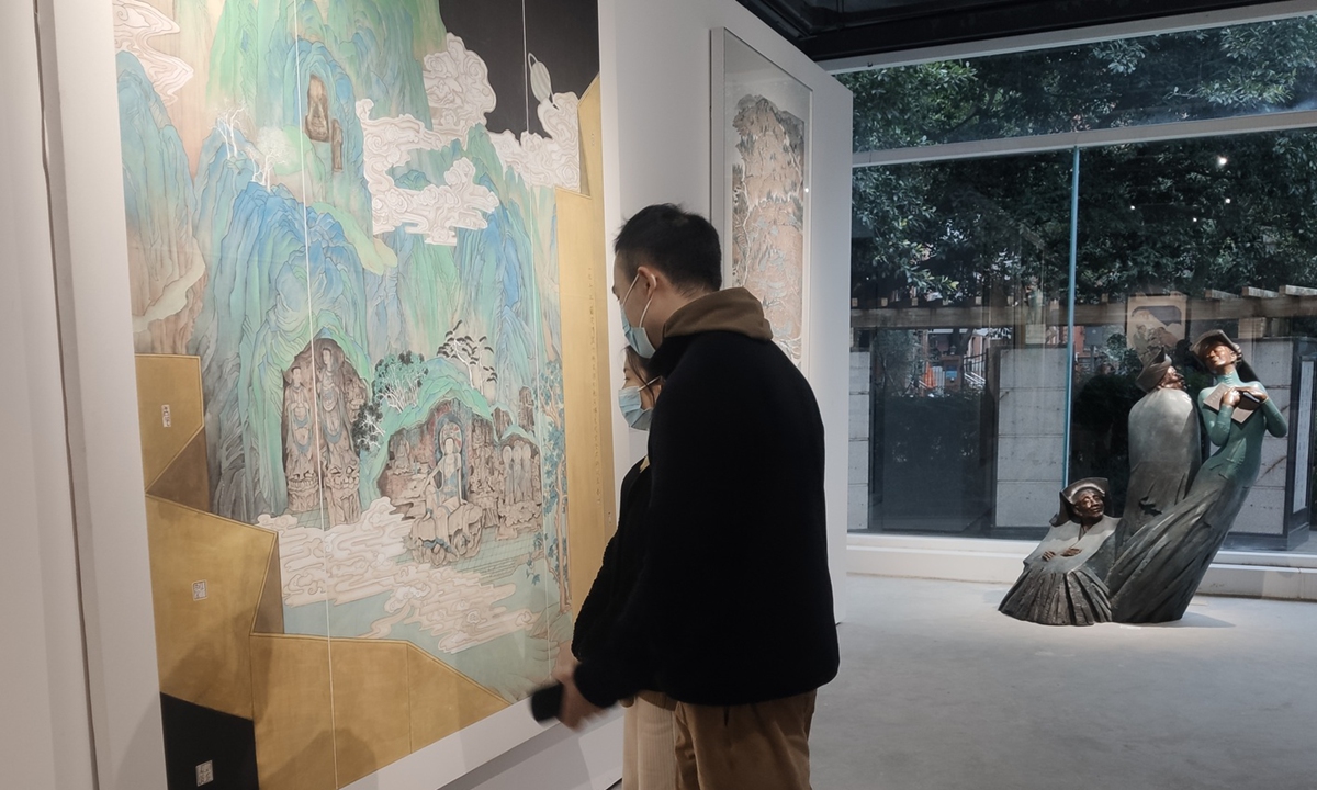 Visitors check the exhibition. Photo: Courtesy of Wang Zhigang 