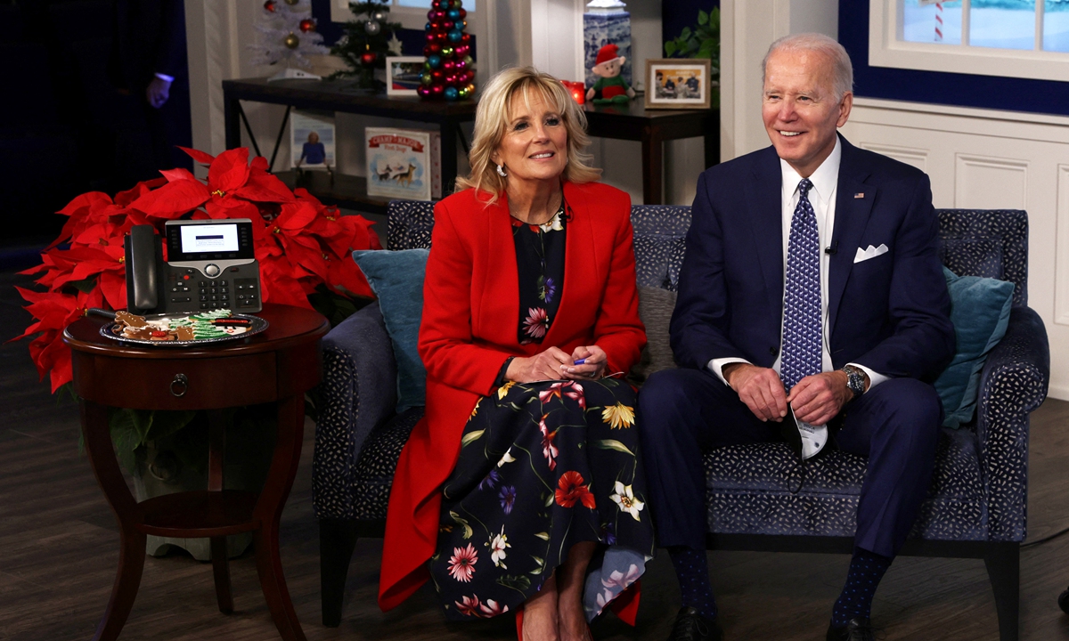 US President Joe Biden and first lady Dr. Jill Biden participate in an event to call NORAD and track the path of Santa Claus on Christmas Eve in the South Court Auditorium of the Eisenhower Executive Building on December 24, 2021 in Washington, DC.Photo:AFP