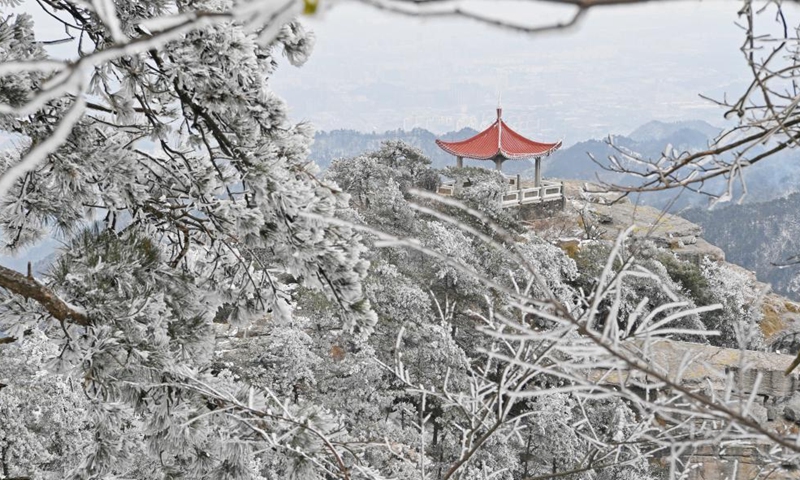 Photo taken on Dec. 26, 2021 shows the view of Lushan Mountain scenic spot after a snowfall in Jiujiang City, east China's Jiangxi Province.Photo:Xinhua