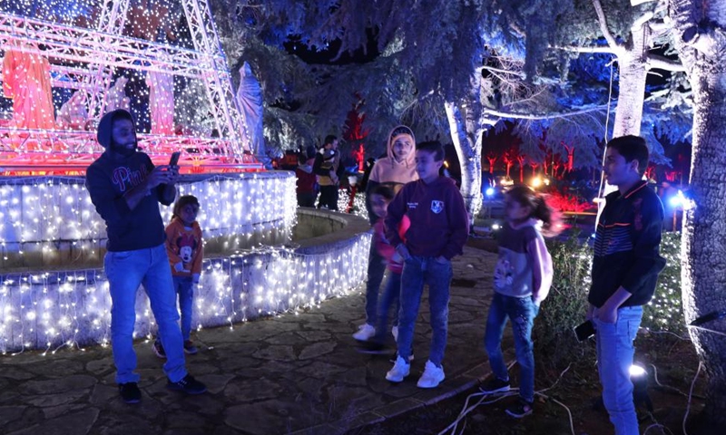 People visit the Christmas village in Zahle, eastern Lebanon, on Dec. 25, 2021.Photo:Xinhua