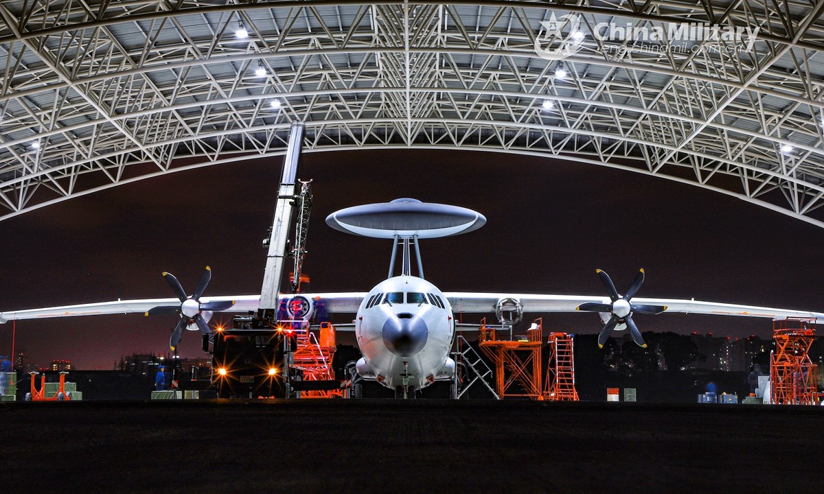 A KJ-500 airborne early warning (AEW) aircraft attached to an aviation division with the PLA Navy receives seasonal maintenance in its hangar in late December. (eng.chinamil.com.cn/Photo by Zhang Dingyi)