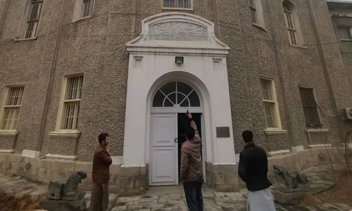 A Koran on display at the museum  The National Museum of Afghanistan in Kabul
Below: A Buddhist statue head at the museum 
Photos: Courtesy of Yu Yong