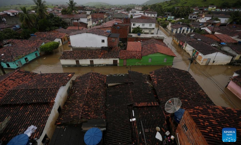 Photo taken on Dec. 28, 2021 shows a flooded area in the city of Dario Meira, Bahia State, Brazil. The death toll from heavy rains lashing the northeastern Brazilian state of Bahia rose to 20 on Monday, with 358 people injured, according to a report released by the state's civil defense authorities.(Photo: Xinhua)
