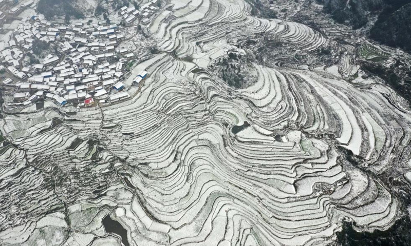 Aerial photo taken on Dec. 28, 2021 shows the winter scenery of terraced fields in Danzhai County, southwest China's Guizhou Province.(Photo: Xinhua)