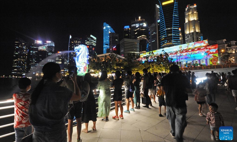 People view the countdown to 2022 light projection show held at Singapore's Marina Bay on Dec. 28, 2021.(Photo: Xinhua)