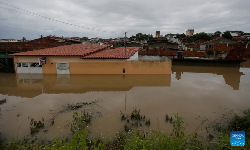 Photo taken on Dec. 27, 2021 shows a flooded area in the city of Itapetinga, Bahia State, Brazil.(Photo: Xinhua)