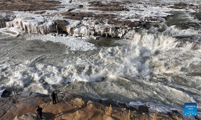 Aerial photo taken on Dec. 30, 2021 shows winter scenery of the Hukou Waterfall on the Yellow River in north China's Shanxi Province.Photo:Xinhua
