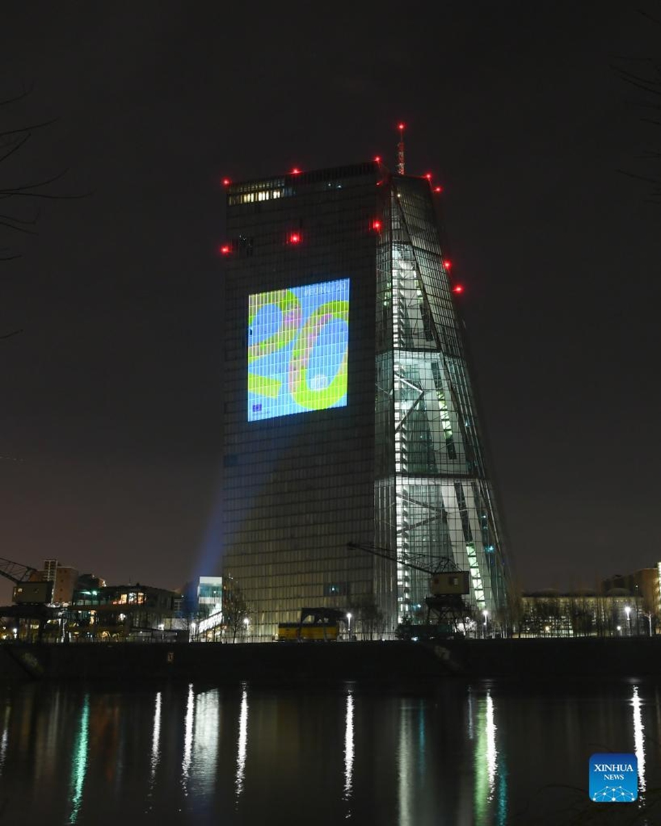 Photo taken on Jan. 1, 2022 shows the headquarters of the European Central Bank illuminated to celebrate the 20th anniversary of Euro banknotes and coins in Frankfurt, Germany. (Xinhua/Lu Yang)