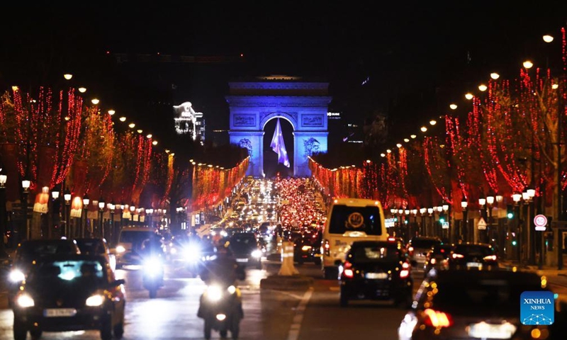 The Arc de Triomphe is lit up in blue to celebrate the start of the French presidency of the European Union in Paris, France, Jan. 1, 2022. The most emblematic landmarks in France turned blue Saturday night to mark French presidency of the EU. (Xinhua/Gao Jing)