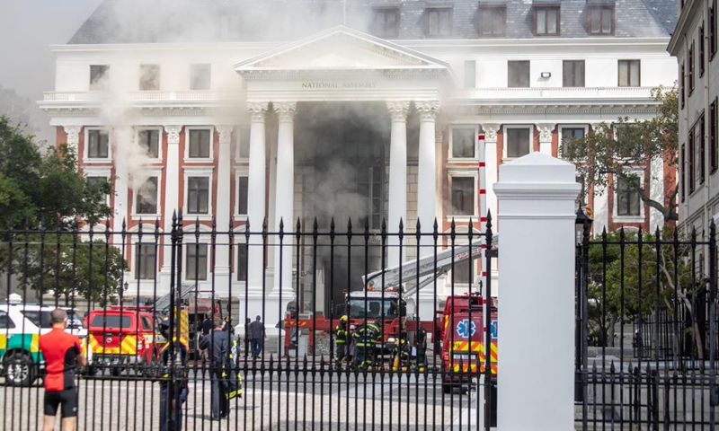 Smoke rises from the National Assembly building of the South African parliament in Cape Town, South Africa, on Jan. 2, 2022.Photo:Xinhua