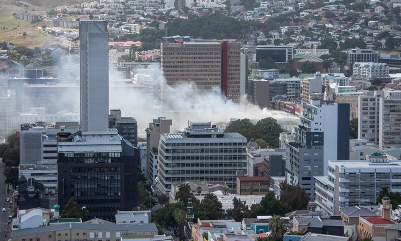 Smoke rises from the South African parliament in Cape Town, South Africa, on Jan. 2, 2022.Photo:Xinhua