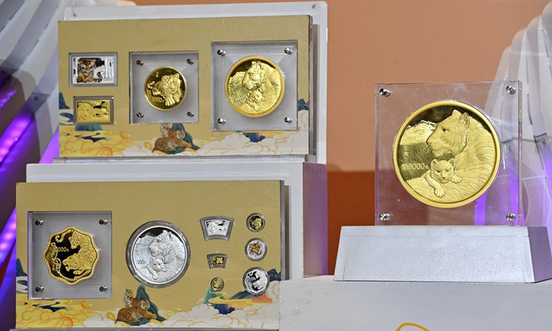 The commemorative coins to celebrate the Chinese zodiac Year of the Tiger are pictured in Beijing, capital of China, Nov. 18, 2021.Photo:Xinhua