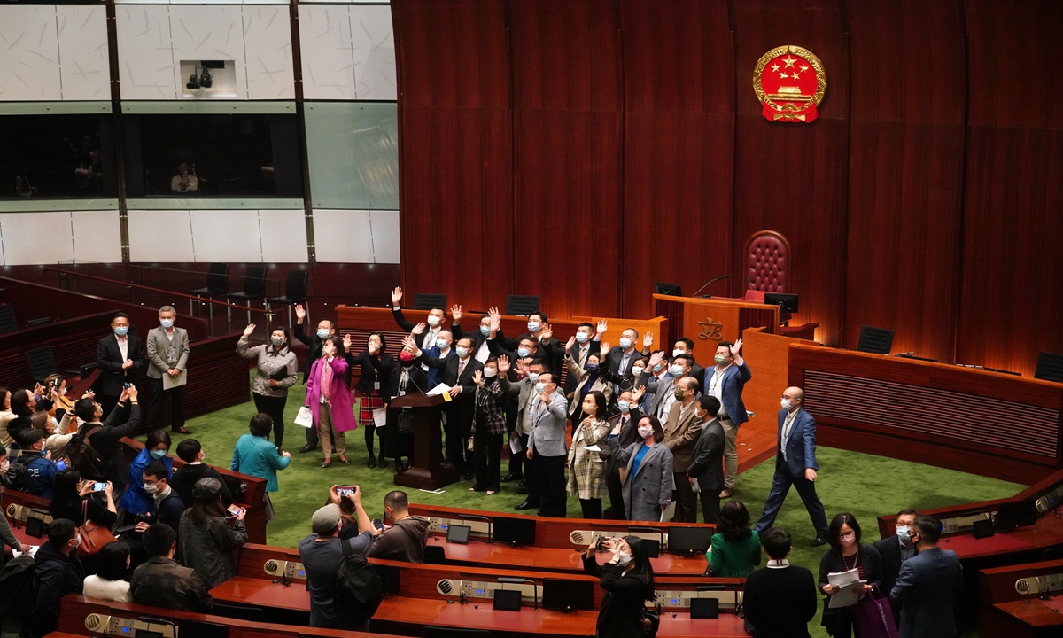 Members of the seventh-term Legislative Council (LegCo) of China's Hong Kong Special Administrative Region wave at the audience during a tour before the oath-taking ceremony on Jan 3. Photo: IC